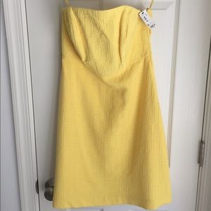 The limited yellow strapless dress NWT
